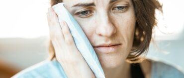 What Causes Tooth Sensitivity and How Can You Treat It?